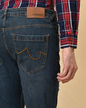 Load image into Gallery viewer, Mid Washed Mild Distressed Skinny Fit Jeans
